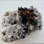 Close-up of a Smoky Quartz Cluster showcasing its smoky, translucent facets and natural texture