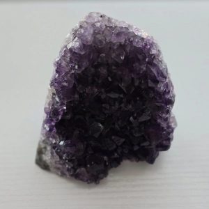 Close-up of an Amethyst Cluster showcasing its deep purple hues and natural form
