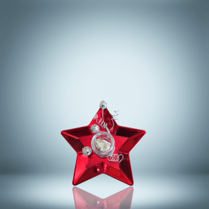 A beautifully arranged holiday gift set featuring muscovite crystals and festive star-themed decorations