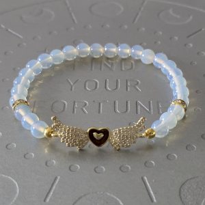 Opalite bracelet with gold embellishments, heart charm, and angel wings charm