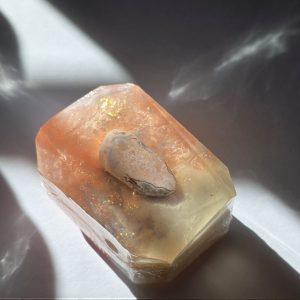 A luxurious crystal bar soap with a pink Botswana agate