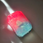 A luxurious crystal bar soap with a prehnite stone, offering harmony and emotional healing properties.