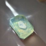 A luxurious crystal bar soap with a blue lace agate, offering clarity and communication-boosting properties.
