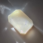 A luxurious crystal bar soap with a clear quartz stone, offering spiritual clarity and enlightenment properties.