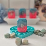 A luxurious crystal bar soap with a prehnite stone, offering harmony and emotional healing properties.