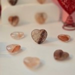 Crimson Healer Hematoid Quartz Crystal Heart on a white background