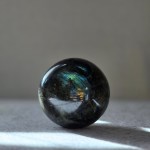 Galactic Radiance Labradorite Sphere - Side View highlighting mystical patterns