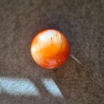 Sunlit Harmony Sphere displayed in a serene meditation space