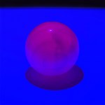 Fluorescent Dreams Pink Calcite fully illuminated under UV light