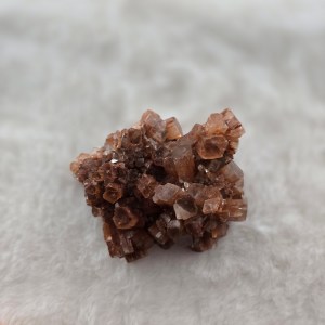 Close-up of an Aragonite Star Cluster showcasing its star-like radiating structure and natural textures