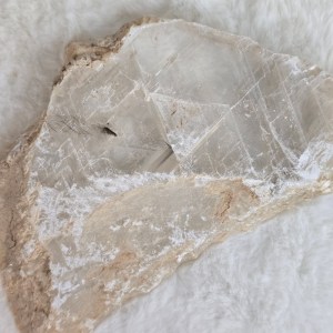 Ethically sourced raw selenite slab on a clean, natural background