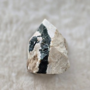 Ethically sourced Indian Turquoise point showcasing mixed green, white, and brown hues with natural textures
