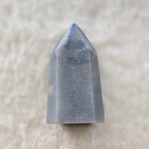 Ethically sourced Blue Aventurine point with a polished finish and refined cut base, showcasing soft blue-green hues and smooth contours